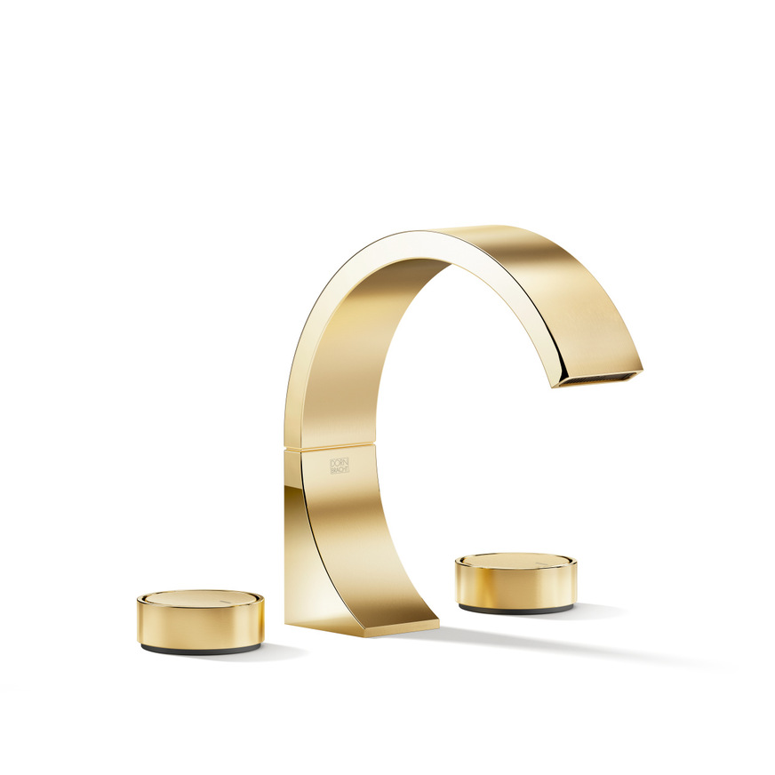 Das „Metropolitan“-Bad folgt dem Motto „Opulenz für die Sinne“ und zeigt die Armaturen der Serie CYO in&nbsp;gebürstetem Messing zusammen mit eloxiertem Aluminium, grünmarmoriertem Granit, Beton, weißem Marmor&nbsp;und cremefarbenem Alcantara und Schurwollteppich.