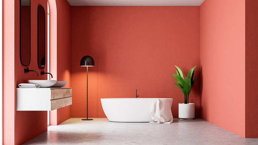 9 Wenn alle Wände in einer kräftigen warmen Farbe angelegt werden, macht dies selbst ein großzügiges Bad intim und gemütlich, aber es wirkt auch kleiner.