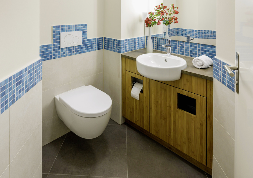 Wie auch im Gäste-WC setzt sich das Gestaltungskonzept in der gesamten Musterwohnung fort.