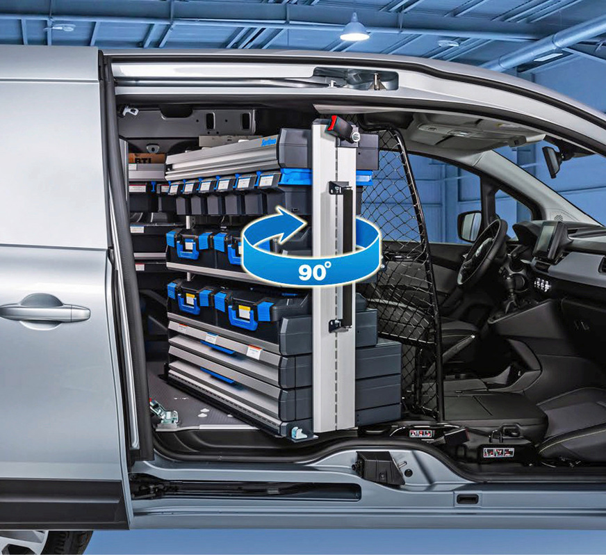 Kangoo L1 ohne B-Säule: Statt Blechtrennwand gibt es hier ein schwenkbares Trenngitter in Kombination mit einem Rotationsregal von Sortimo – als Ausbauvorschlag für ein Servicefahrzeug.