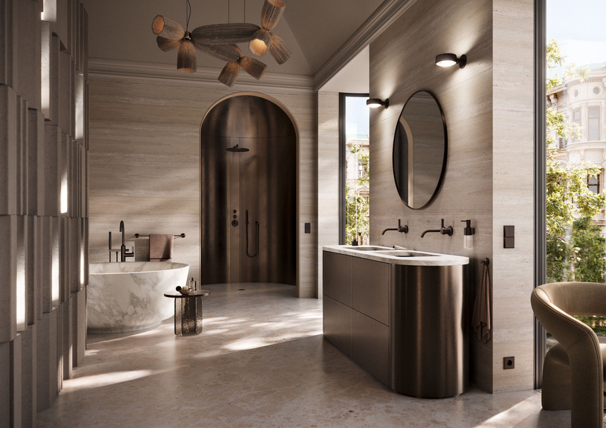 Kohärente Gesamtästhetik: Die Badarchitektur zeigt die Armaturen und Duschlösungen der Designserie Vaia von Dornbracht sowie den LS 990 Zweifachschalter und Steckdosen von Jung in der einheitlichen Oberfläche Dark Bronze gebürstet.