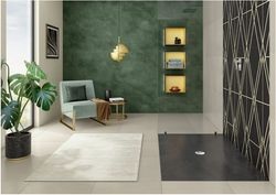 <p>Pflanzen, ein Teppich, eine grüne Wand, ein Sessel und eine bodenebene Duschfläche: das moderne Badezimmer wird zum Lifestyle-Bad mit hoher Aufenthaltsqualität.</p> - © Villeroy&Boch