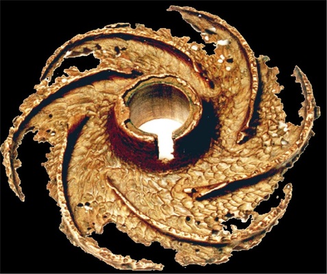 Laufrad einer Kreisel­pumpe, das durch Kavitation zerstört wurde.