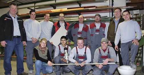 Firmeninhaber Markus Tyborski (links) mit seinem Team. - © wortschatz / Riedesser
