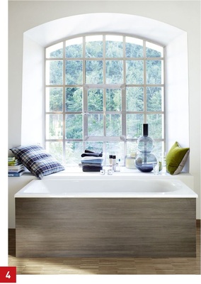 Kissen und Decken in Häkel- oder Strickoptik zaubern eine gemütliche Atmosphäre und liegen im Trend.