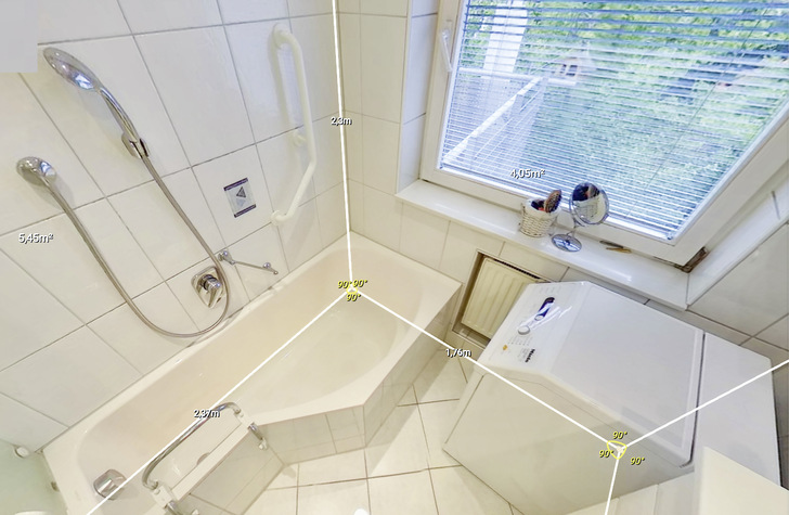 Automatische Raumvermessung mittels KI. Ein Badezimmer wurde von einer künstlichen Intelligenz ausgemessen.