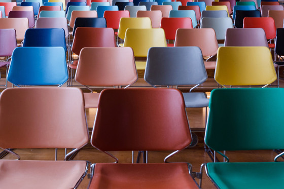 Rows of colorful chairs in Auditorium