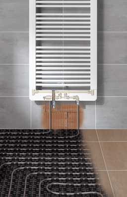 Die x-link Anschlussgarnituren binden den Fußbodenheizungskreis über den Badheizkörper an das vorhandene Heizkörpernetz an.